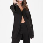 FLARED TROUSERS WITH ELASTICATED WAIST