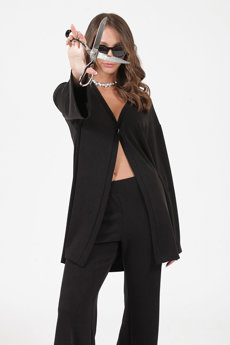 FLARED TROUSERS WITH ELASTICATED WAIST