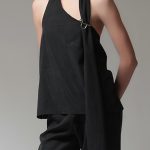 BACKLESS TOP WITH LOGO PIN DETAIL — BLACK