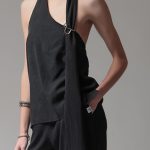 BACKLESS TOP WITH LOGO PIN DETAIL — BLACK