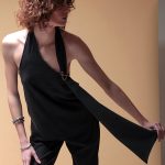 BACKLESS TOP WITH LOGO PIN DETAIL — BLACK