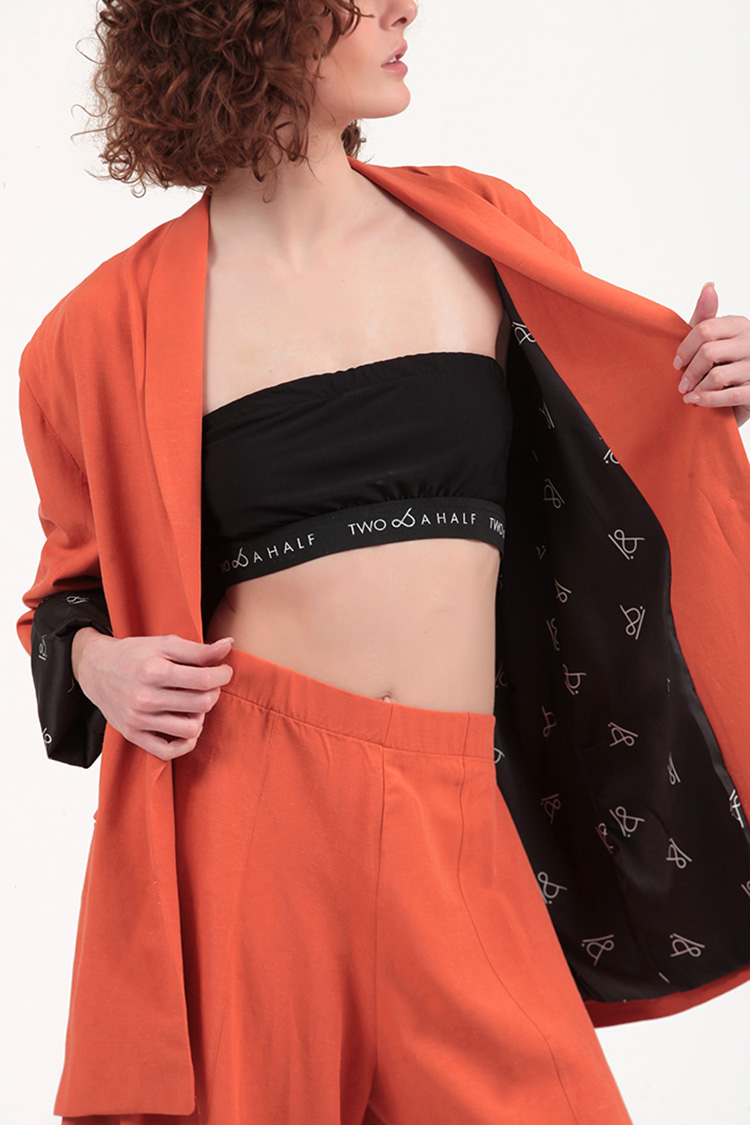 UNISEX BLAZER WITH OVERSIZED SHOULDERS AND LOGO BUTTON DETAIL — ORANGE