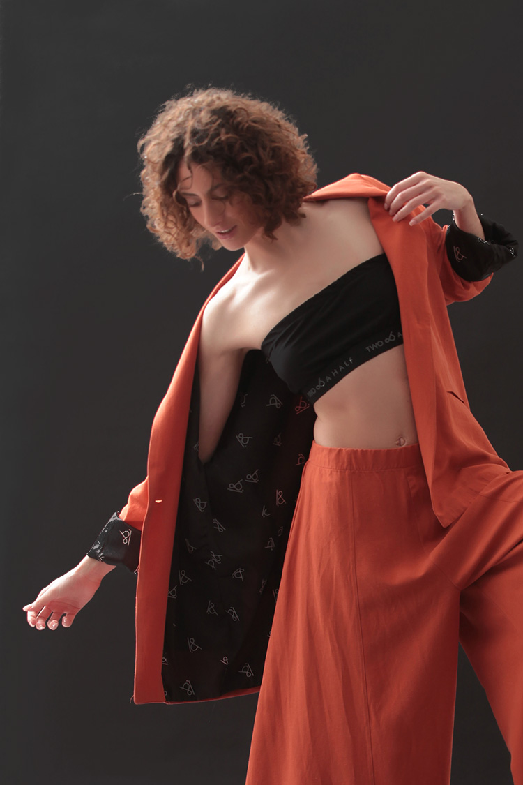 UNISEX BLAZER WITH OVERSIZED SHOULDERS AND LOGO BUTTON DETAIL — ORANGE