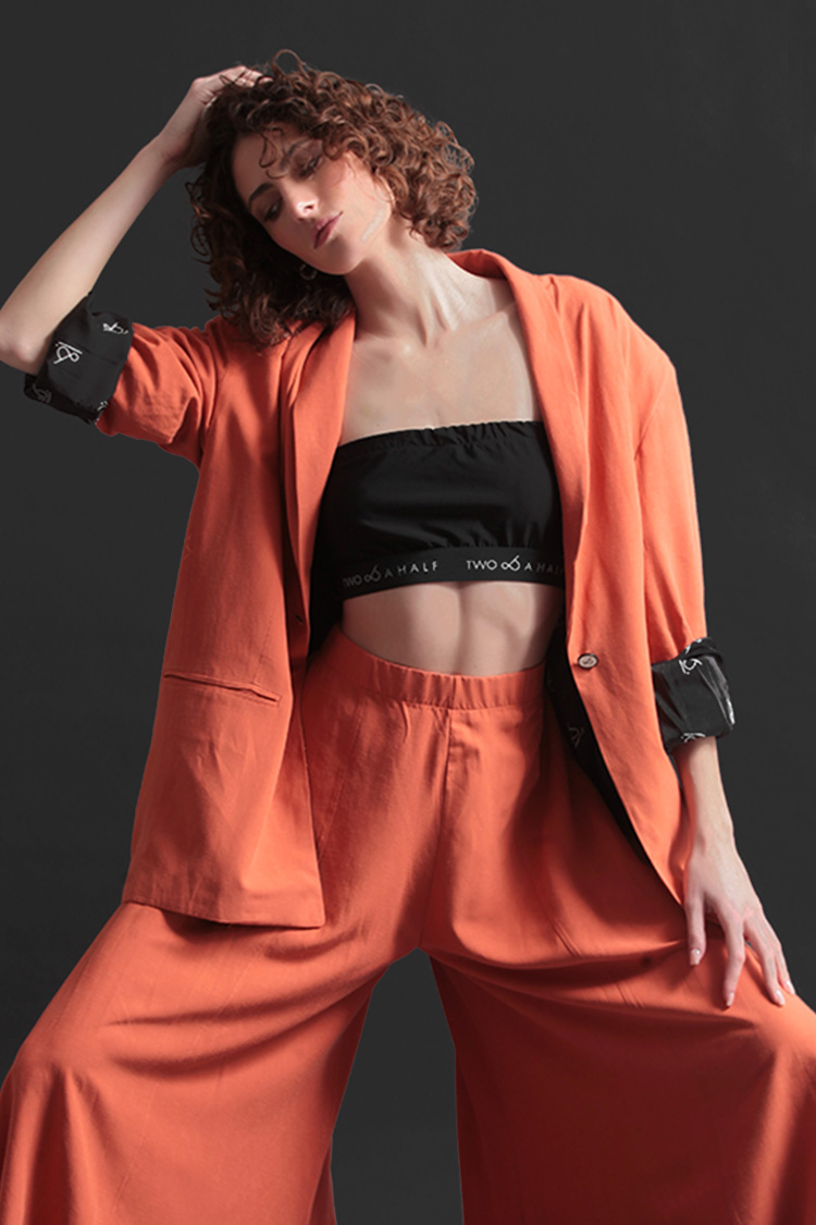 UNISEX BLAZER WITH OVERSIZED SHOULDERS AND LOGO BUTTON DETAIL — ORANGE