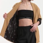 UNISEX BLAZER WITH OVERSIZED SHOULDERS AND LOGO BUTTON DETAIL — BEIGE