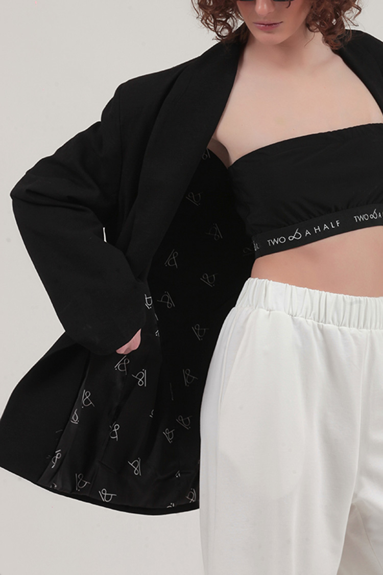 UNISEX BLAZER WITH OVERSIZED SHOULDERS AND LOGO BUTTON DETAIL — BLACK