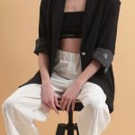 UNISEX BLAZER WITH OVERSIZED SHOULDERS AND LOGO BUTTON DETAIL — BLACK