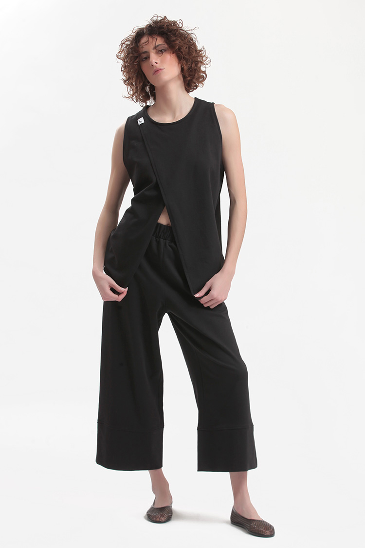 SLEEVELESS TOP WITH ASYMMETRIC FRONT OPENING