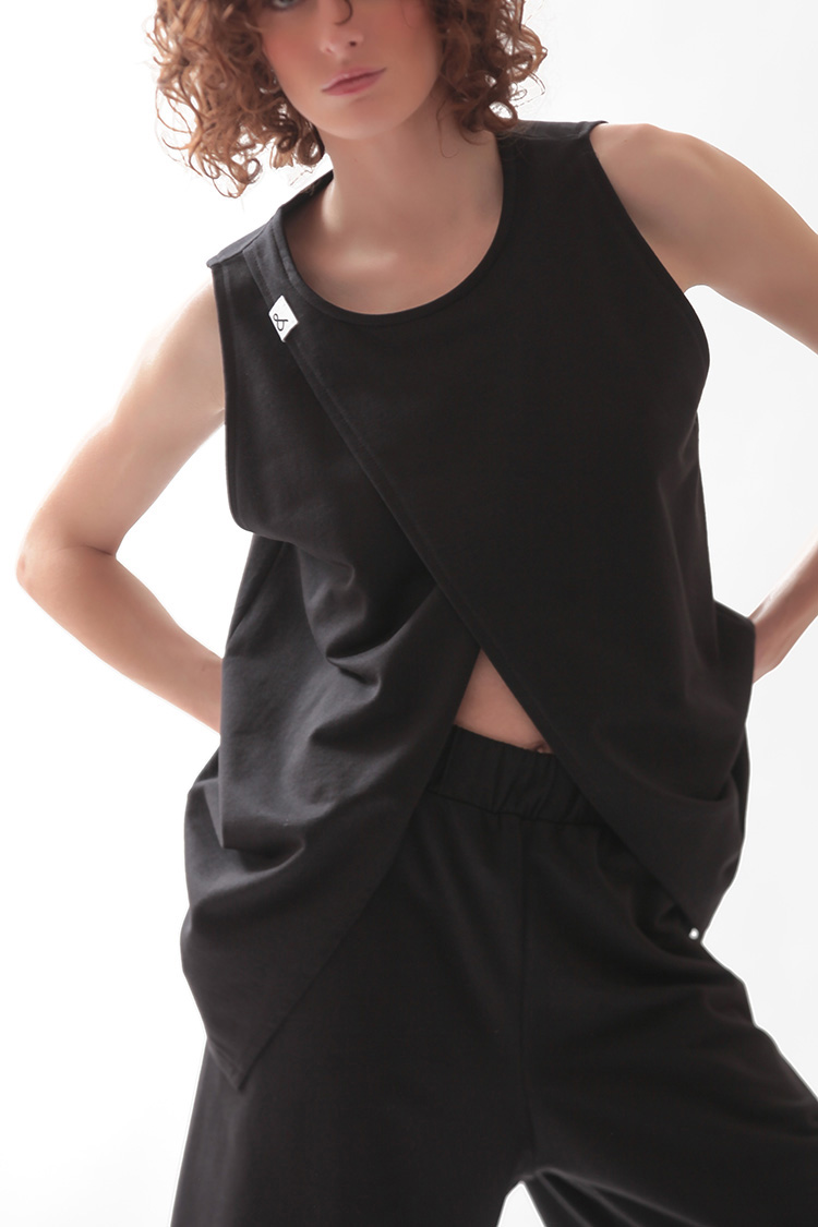 SLEEVELESS TOP WITH ASYMMETRIC FRONT OPENING